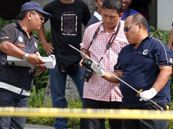 В резиденции малайского премьера застрелили мужчину с мечом