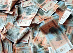 Нацбанк изымает рубли триллионами, ставки упали до 20%