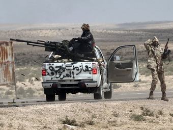 Ливийские повстанцы обвинили НАТО в бездействии