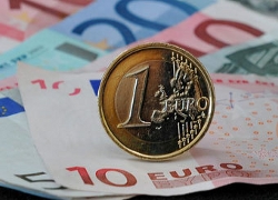 Еврокомиссия: Литва успешно перешла на евро