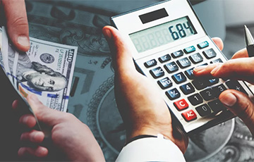 Сколько минчан платят «налог на богатых»?