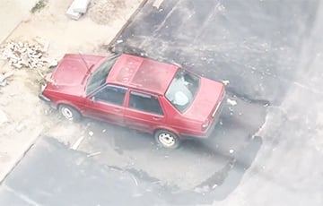 Беларуска «силой соцсети» заделала яму на парковке под окном