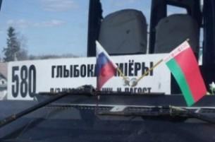 С белорусских автобусов снимают российские флажки, а водителей - штрафуют