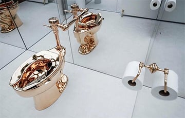 На аукционе продали золотой унитаз за $12,1 млн