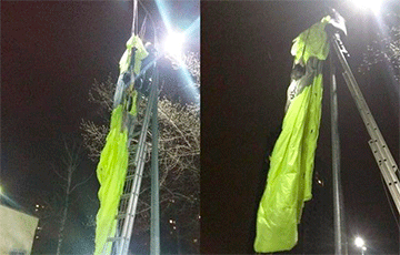 В Киеве мужчина прыгнул с парашютом с дома и зацепился за электроопору